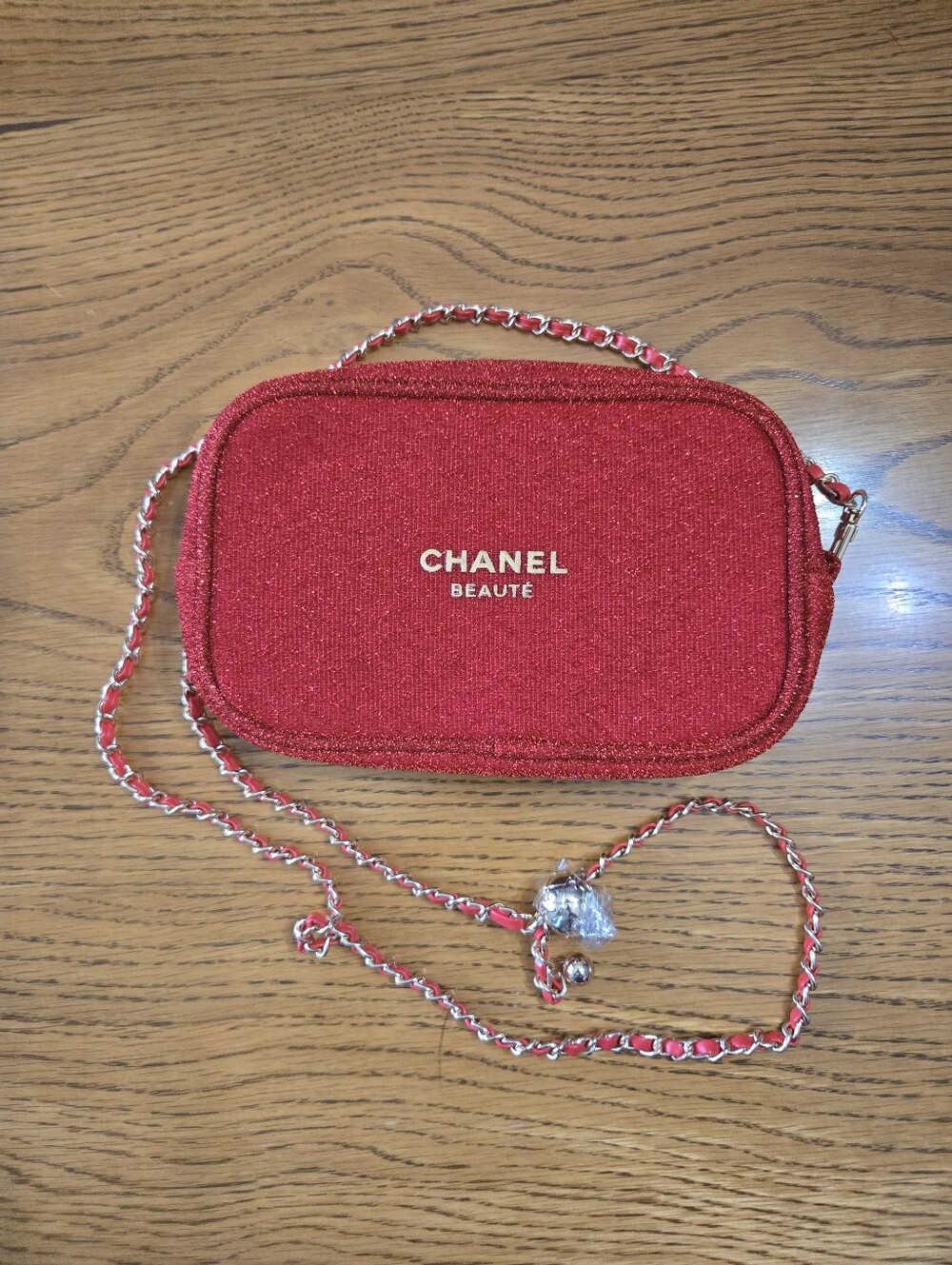 2-piece Gift With Purchase. Red Metalic Crossbody Handbag And Compact Mirror.